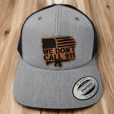 We Don't Call 911 AR & American Flag Leather Patch Trucker Hat - Trucker Hat - Charm and Char